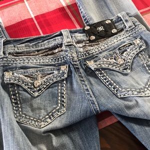 Light wash miss me blue jeans